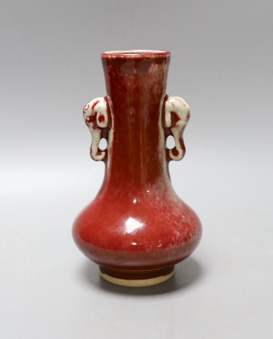 A Chinese sang de boeuf two handled vase - 16cm high